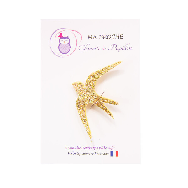 broche enfant hirondelle paillette or