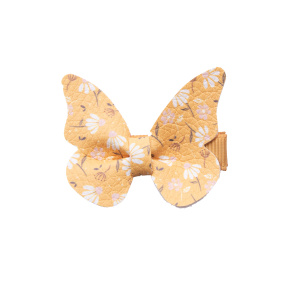 Barrette papillon fleurs jaune moutarde