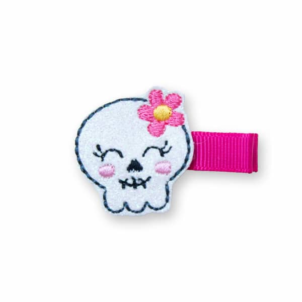 Barrette enfant tête de mort pailletée blanche avec fleur rose – accessoire cheveux Halloween fille